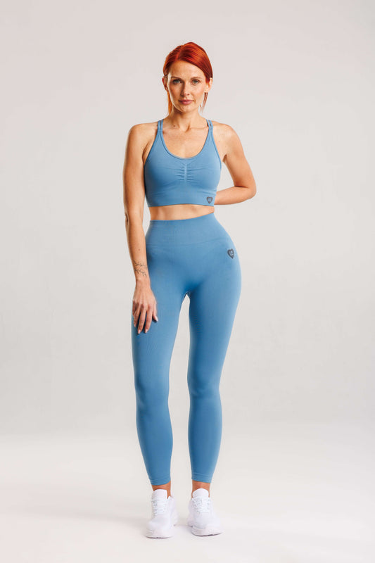 Zestaw bezszwowy PUSH UP V-SHAPE top + legginsy lazurowy - Savannah