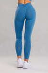 Legginsy damskie bezszwowe PUSH UP V SHAPE lazurowy - Savannah